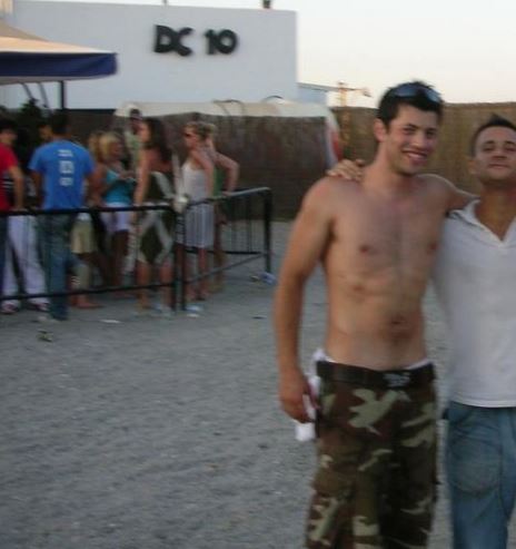 topless man outside DC-10 Ibiza