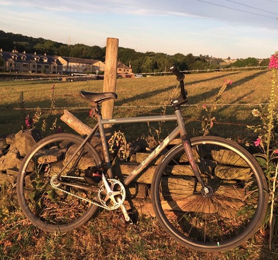 picture of a condor cycles pista fixed gear track bicycle in a field near the leeds to liverpool canal in yorkshire