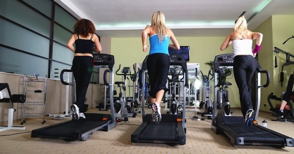 3 women using treadmills